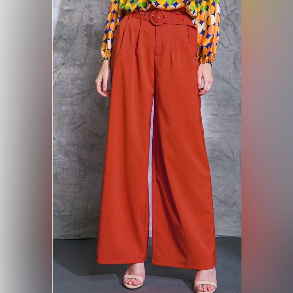 Orange flying tomato trouser pants size large. Never been worn